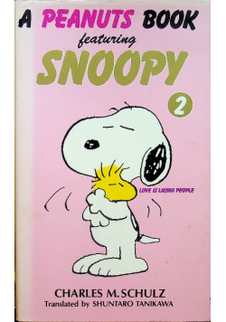 A peanuts book featuring Snoopy tom 2