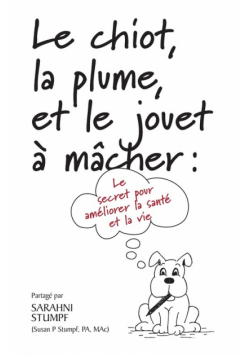 Le chiot, la plume, et le jouet à mâcher