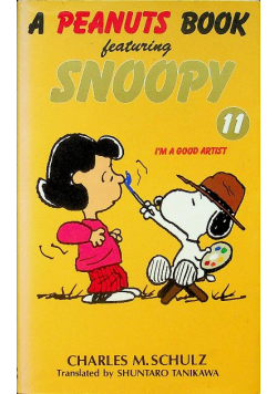 A peanuts book featuring Snoopy tom 11