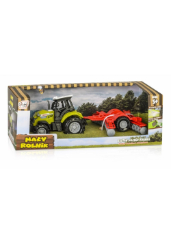 Traktor z agregatem uprawowym